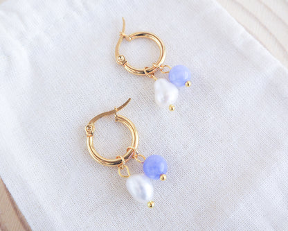 Gold Freshwater Pearl Earrings with Gemstones on display, ocean inspired jewelry, wedding earrings