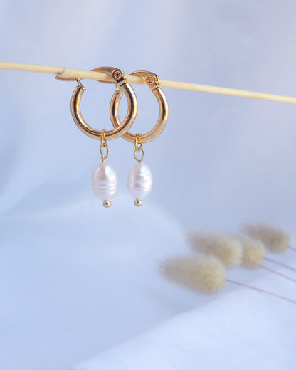 Gold Ivory White Pearl Earrings close up