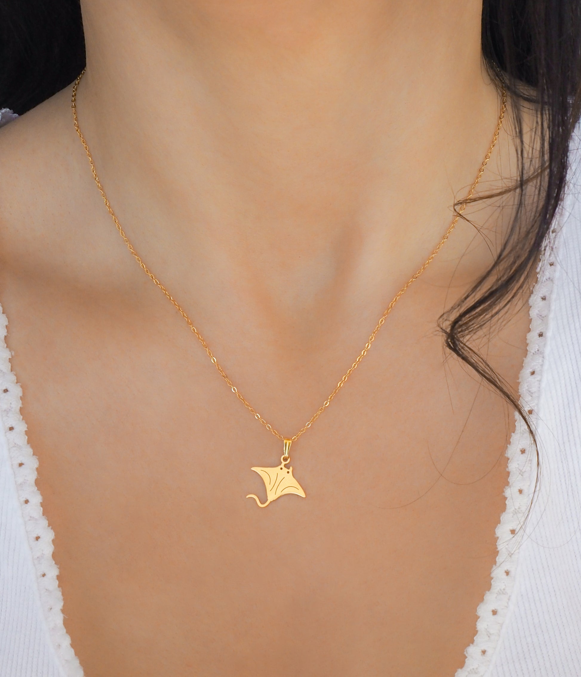 Gold Manta Ray Necklace on neck