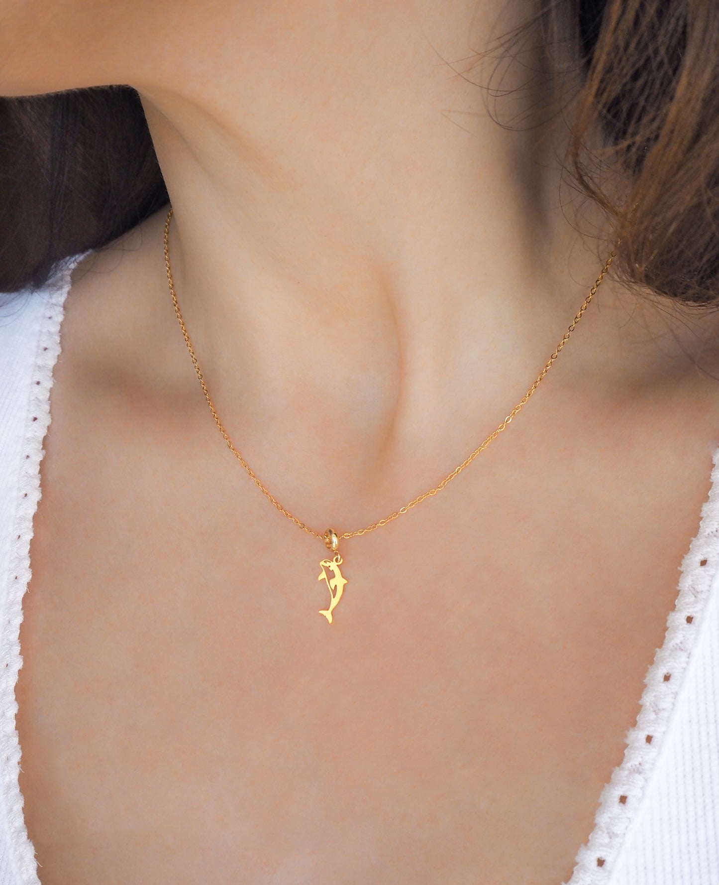 Gold Killer Whale necklace on model, Orca Necklace 