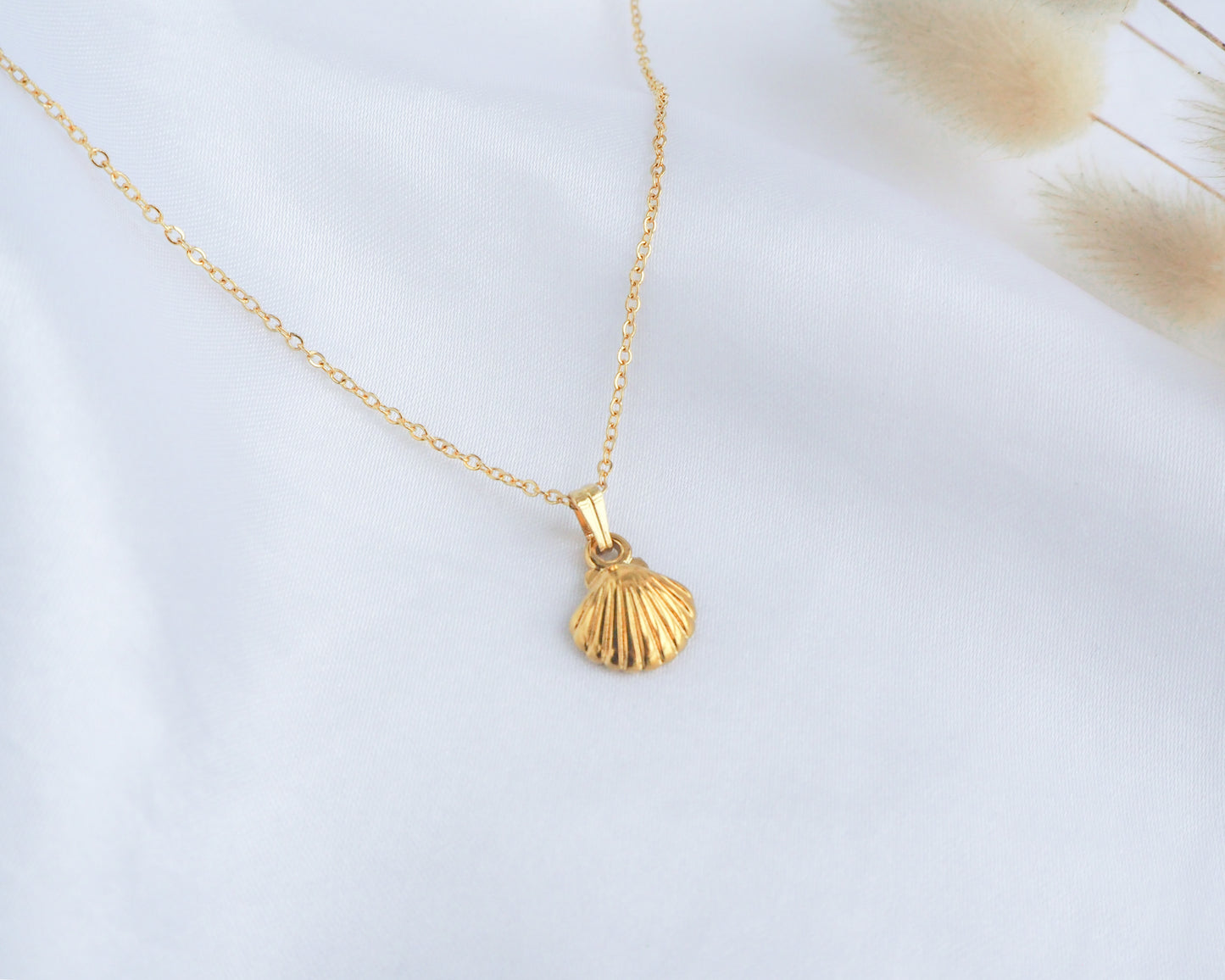 Gold tiny shell pendant on silk