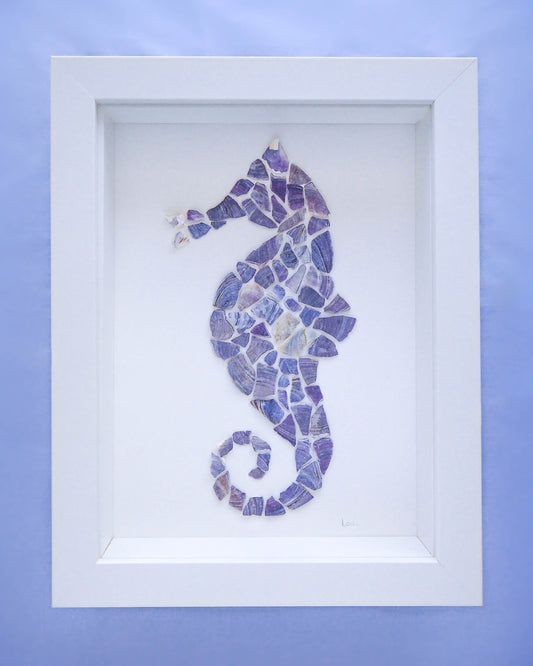 A captivating full view of the Blue Mussel Shell Seahorse Mosaic, showcasing the intricate seahorse silhouette crafted with vibrant blue mussel shells. SEABYLOU, Sea by lou