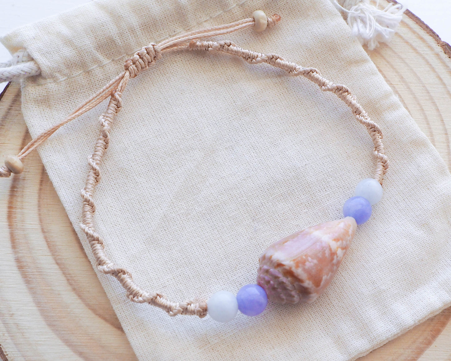 Handcrafted Cone Shell and Angelite Quartz Bracelet on Gold Braided Cord - a Beach-inspired Delight