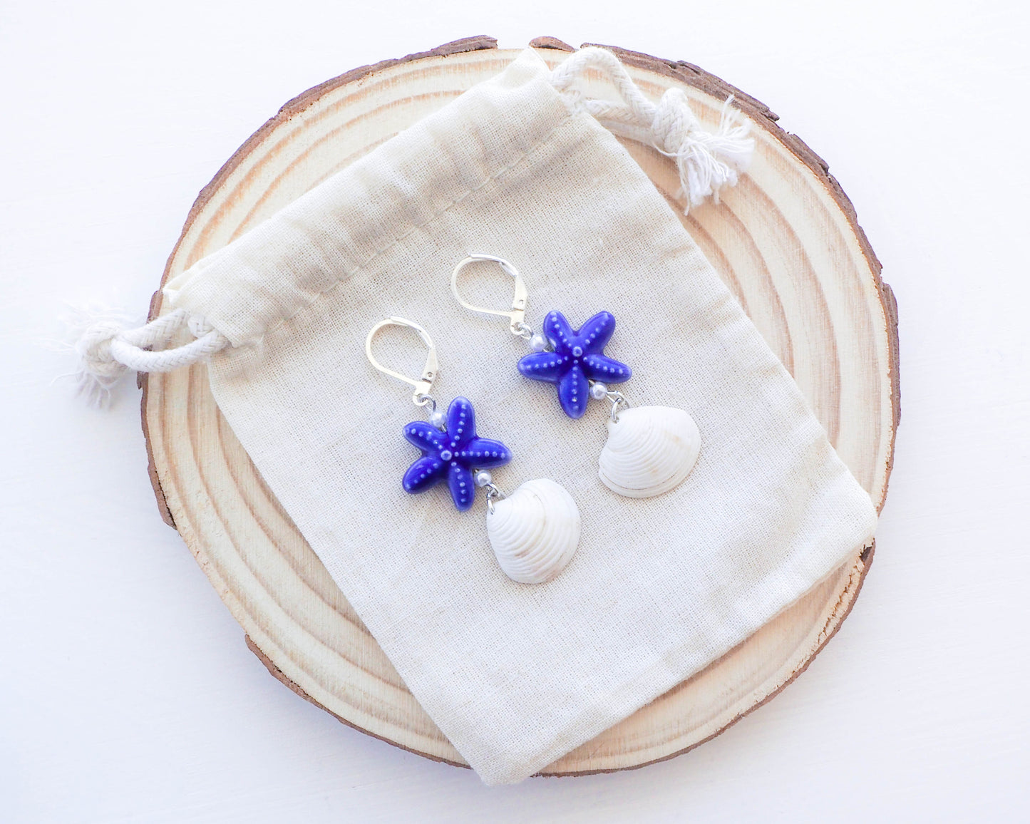 "925 Silver Earrings - Coastal Beauty with Blue Ceramic Sea Stars and White Venus Shell