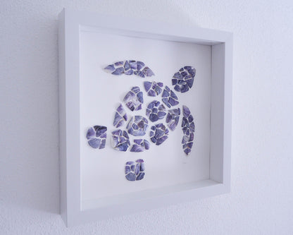 Ready-to-Hang Seashell Turtle Art: The front of the Seashell Turtle Art, featuring the attached hanger for convenient display. Hanging Shell Art, Coastal Wall Decor, Sea by Lou