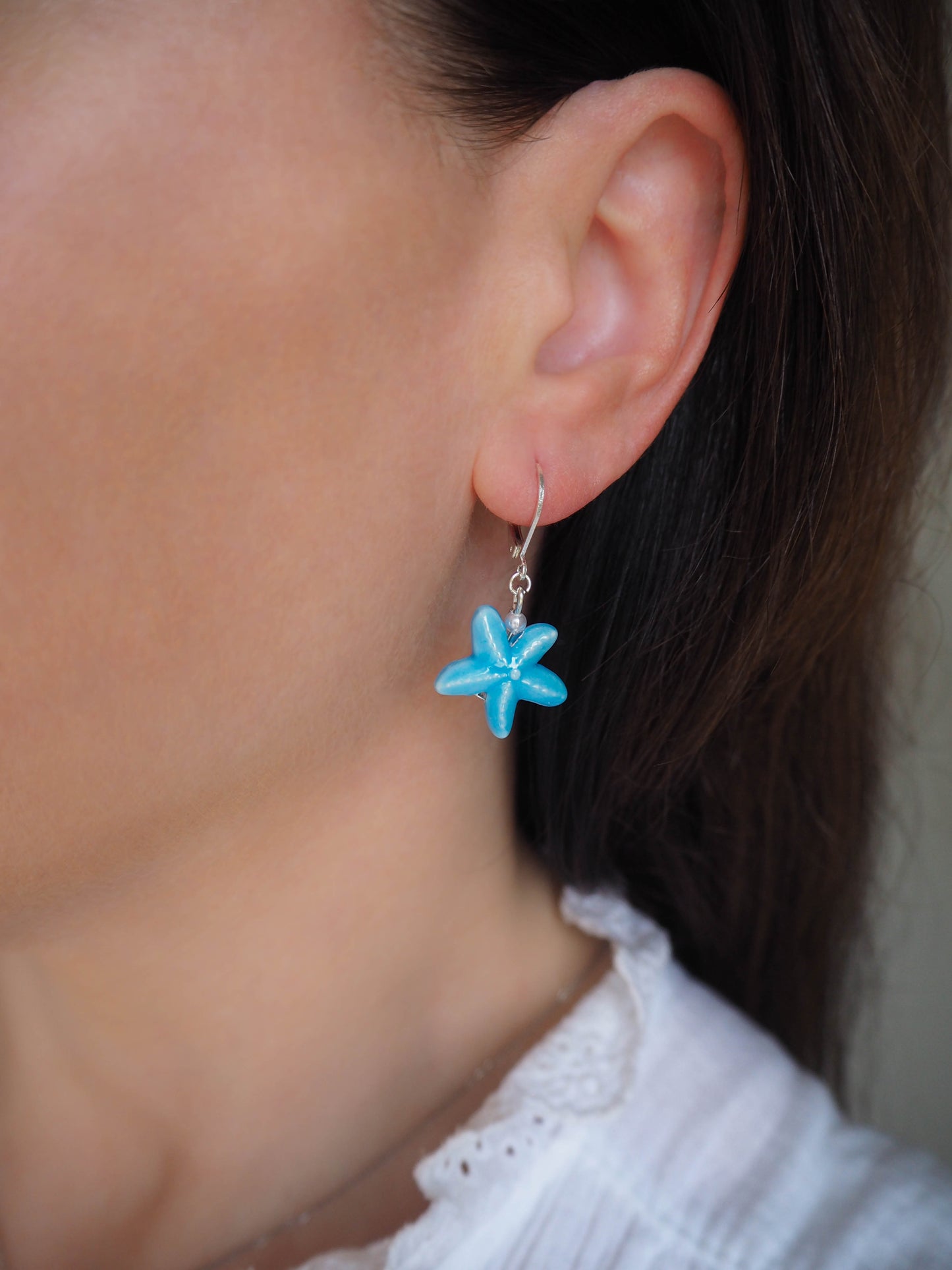 Model wearing Blue Ceramic Sea Star Earrings, Starfish Earrings, Porselein, Seabylou