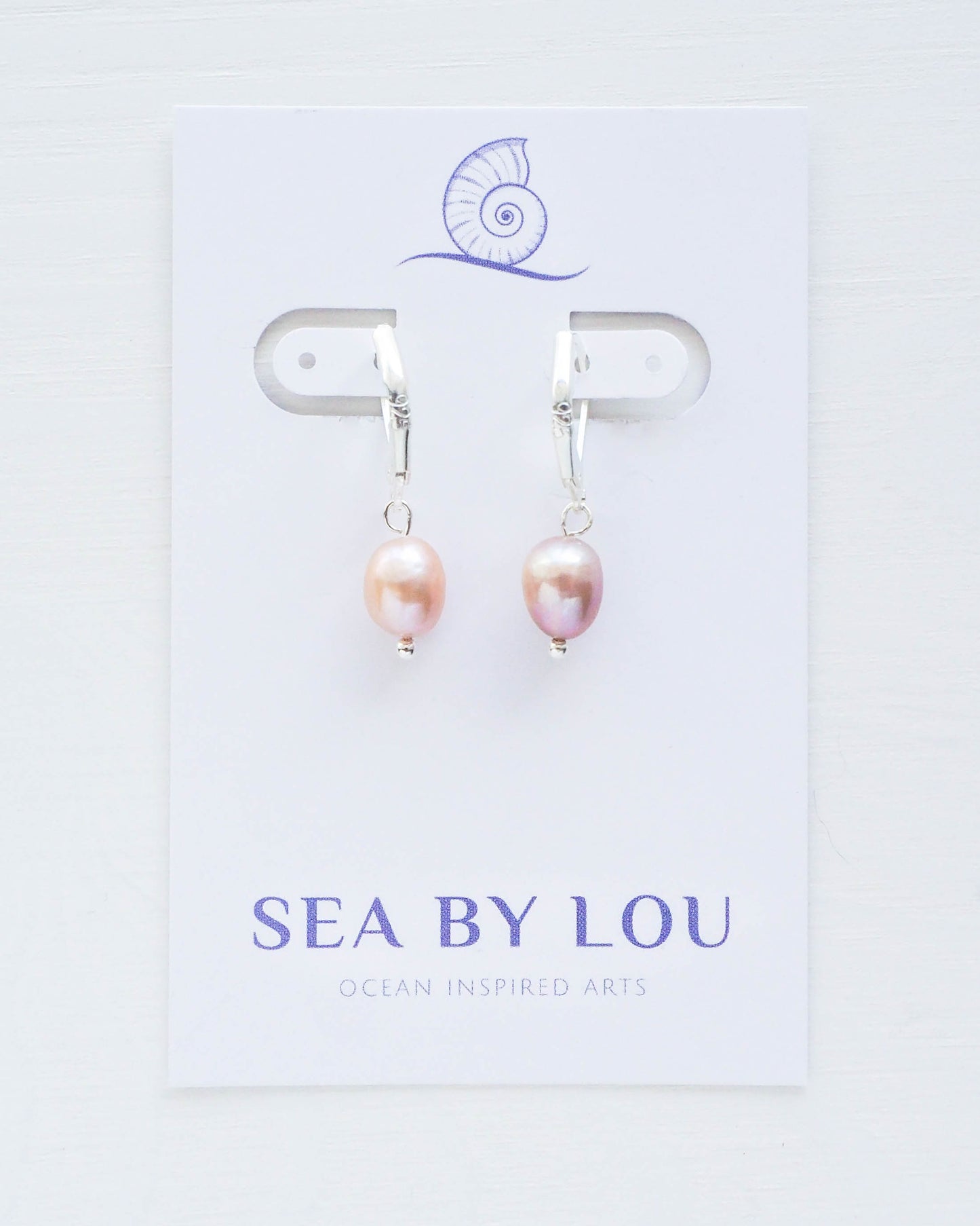 Stylish Beach Ensemble Featuring Rose Pink Freshwater Pearls Earrings: "Seaside Charm – Elevate Your Look with Seachic Earrings and Beach Chic Fashion
