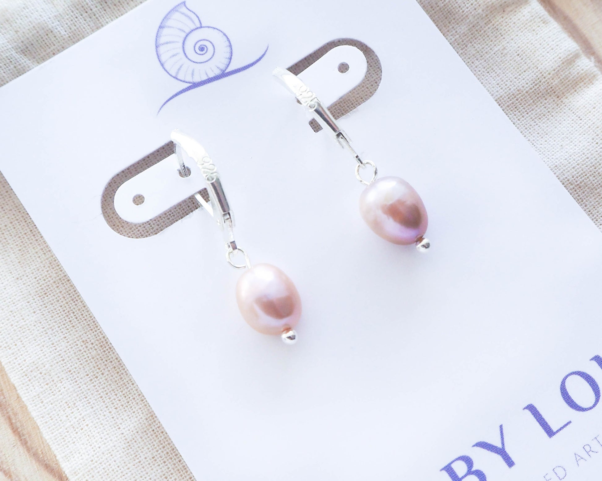 Close-up of Rose Pink Freshwater Pearl Detail: "Lustrous Freshwater Pearl – Nature's Gem in Every Seachic 925 Silver Earring.