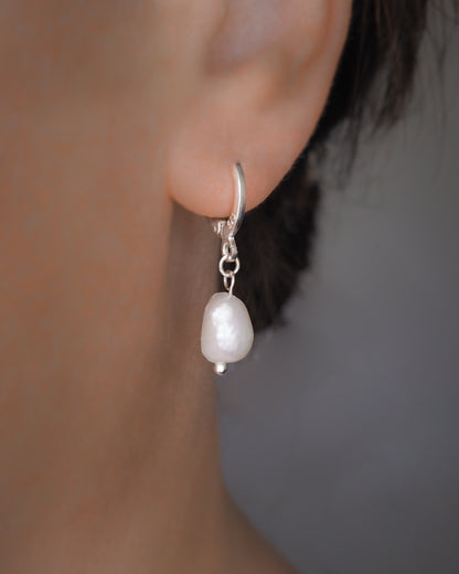 Model wearing White Pearl 925 Silver earrings, coastal wedding jewelry