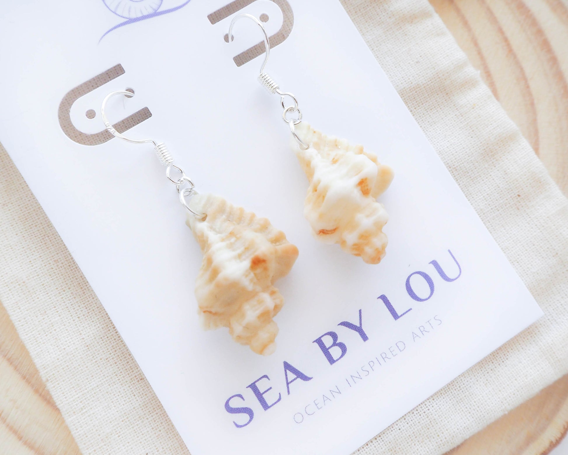 Close-up of Sterling Silver Earrings with European Sting Winkle Shells, Portugal Beach Collection