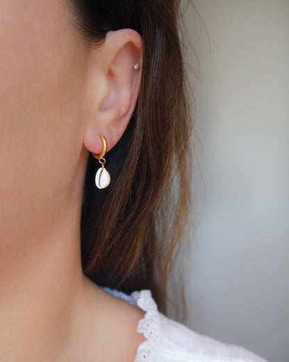 Model wearing Gold Earrings with Cowrie Shells from Portugal