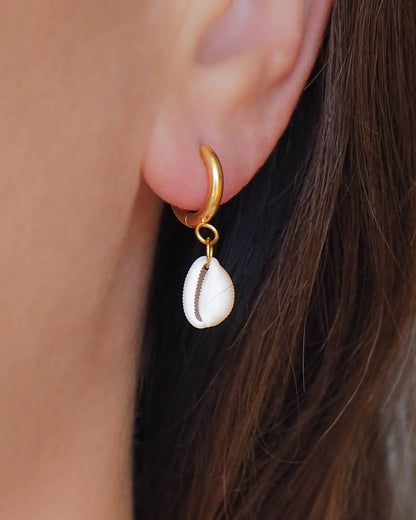 Model wearing Stainless Steel Gold Earrings with Cowrie Shells from Portugal