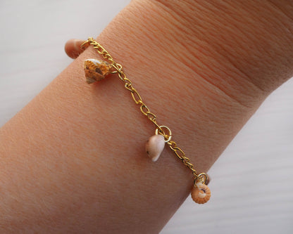 Model wearing Tiny Shells with Gold chain- Handcrafted Charm Bracelet for Seaside Glam