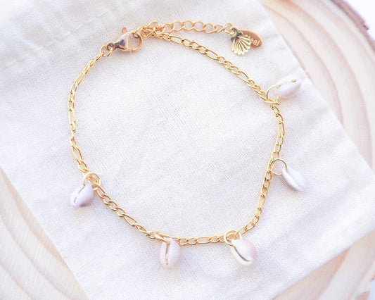 Portugal Coastal Charms: Handpicked Tiny Cowrie Shells Bracelet - Gold Stainless Steel Charm bracelet, Nature-Inspired Jewelry