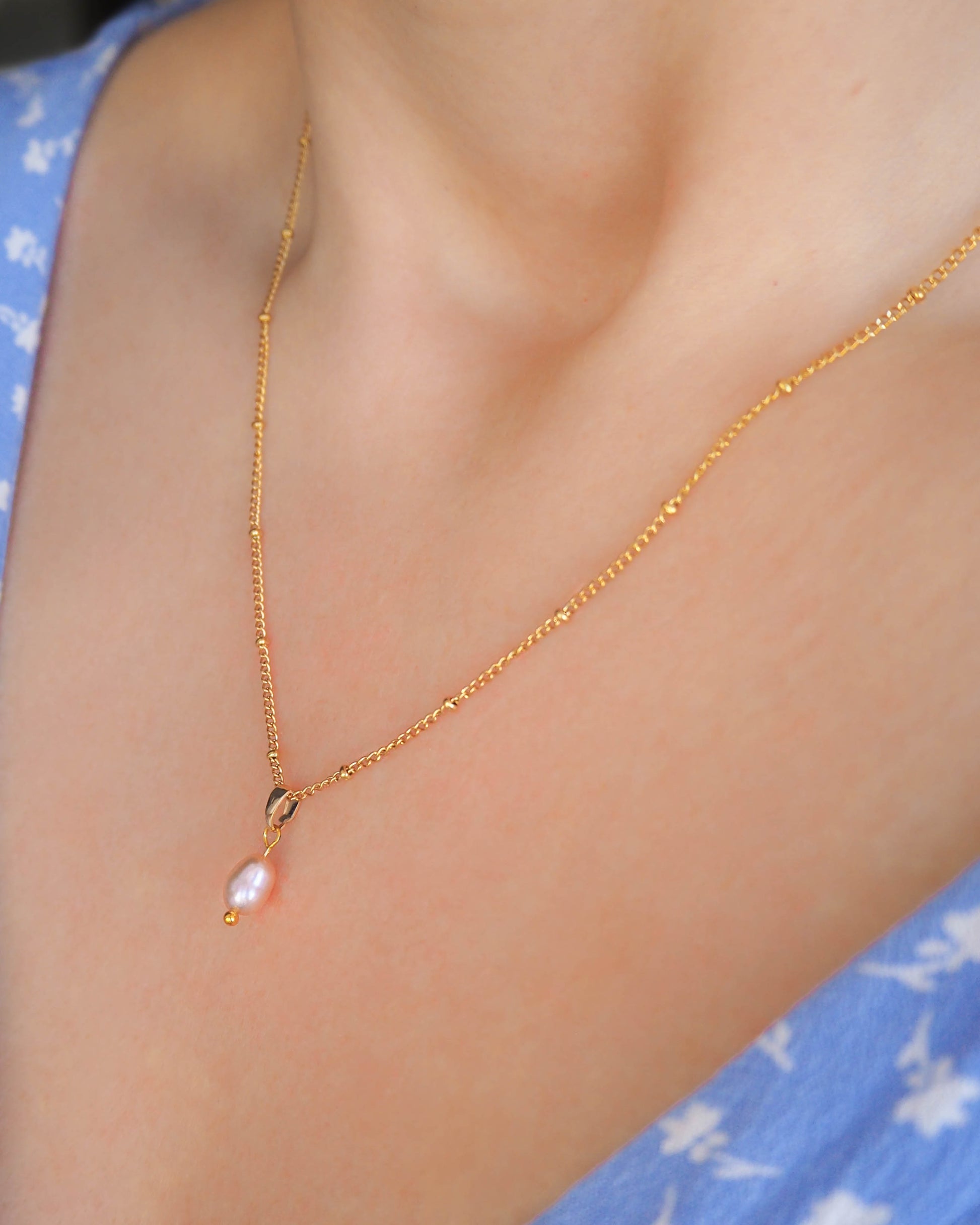 Model wearing Gold Necklace adorned with Freshwater Pearl Pendant, seabylou, wedding jewellery