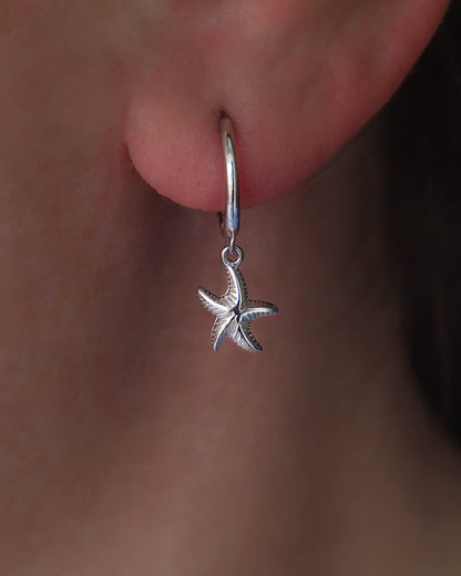 Model wearing Sterling Silver Earring Hoops with Sea Star Pendants - Coastal Chic Jewelry, SeabyLou