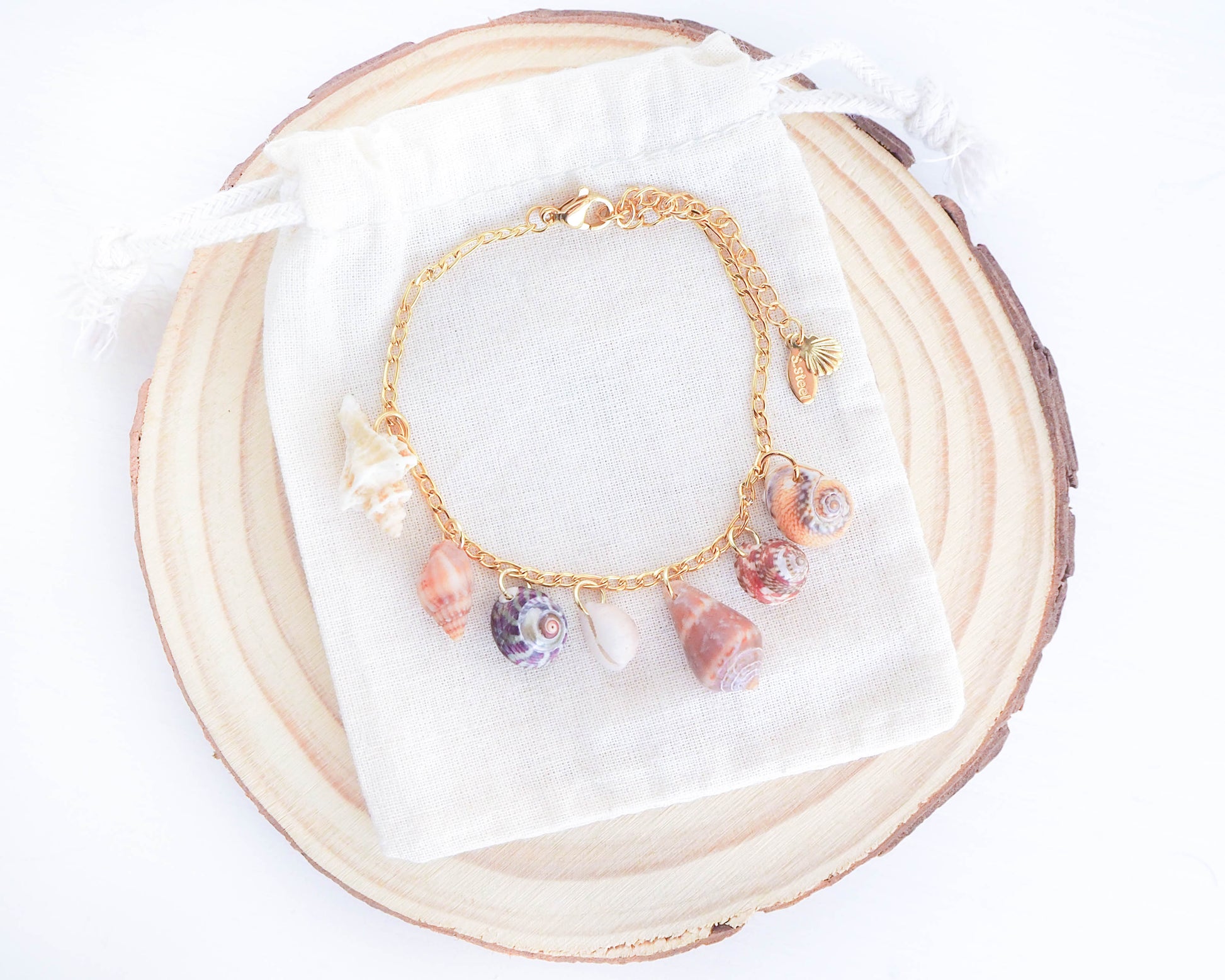 Tiny Shells Gold Charm Bracelet: ocean-inspired jewelry from Portugal