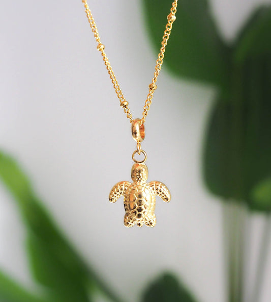 Close up of Gold Stainless Steel Turtle Necklace