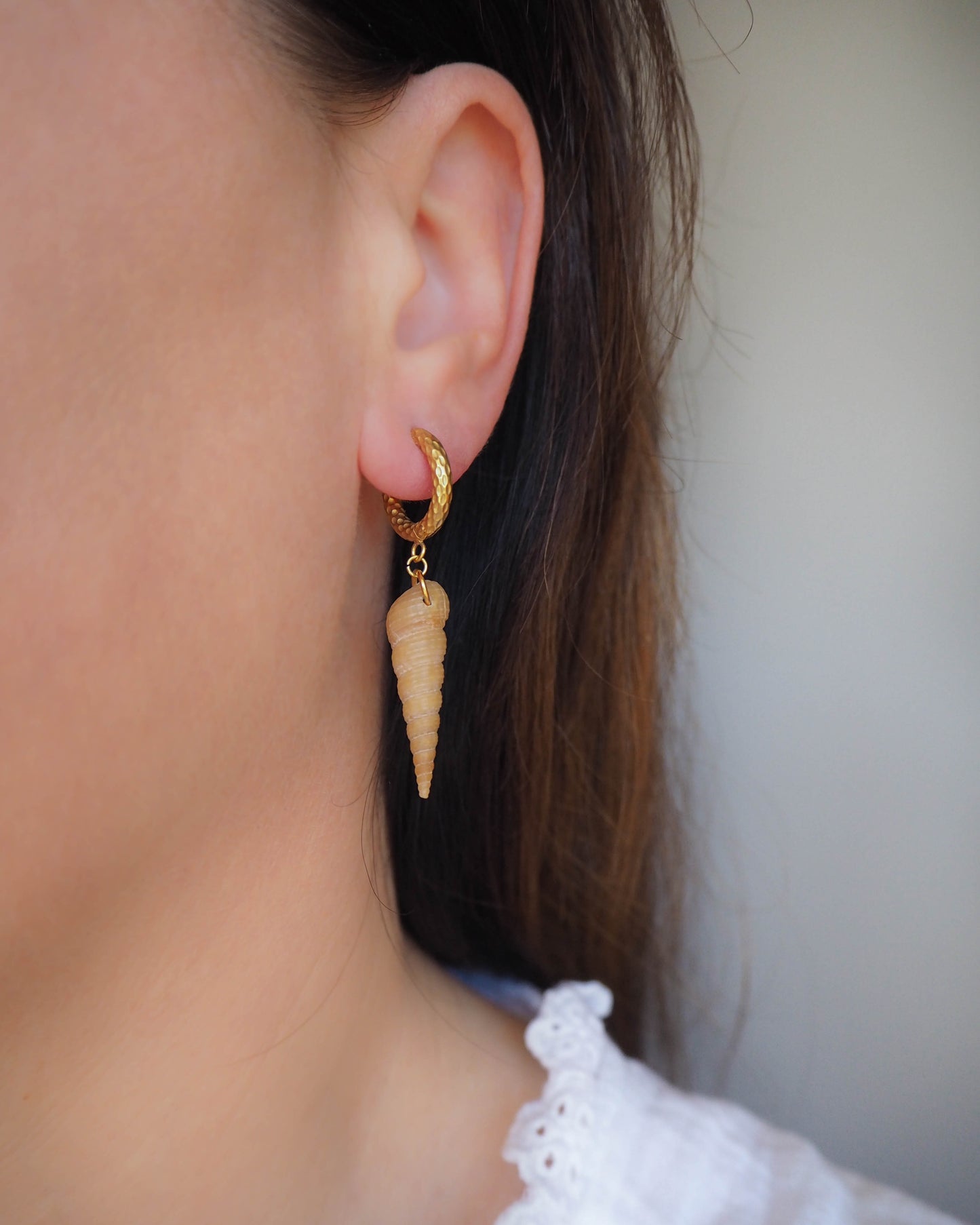 Model wearing Boho Beach Style: Tower Shell Earrings with Gold Loop Hooks – Seaside Chic Jewelry - Real Shell Earrings -Sea by lou