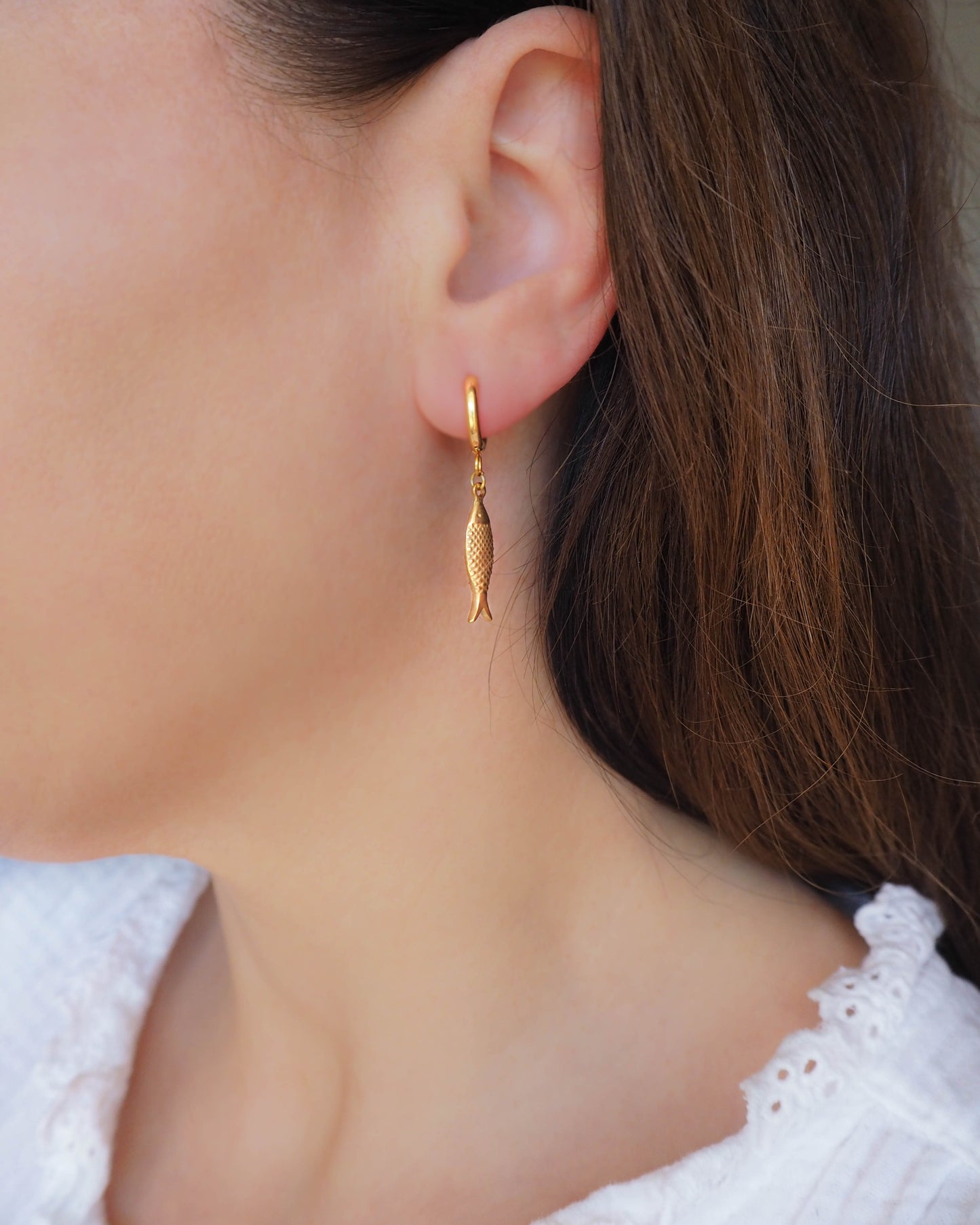 Model wearing Gold Sardine Fish Earrings - Coastal Jewelry from Portugal, seabylou, Sea by Lou, Fish earrings