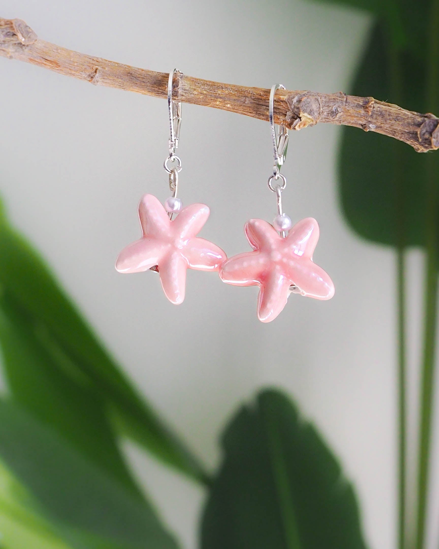 Pink Sea Star Earrings made with 925 sterling silver on display
