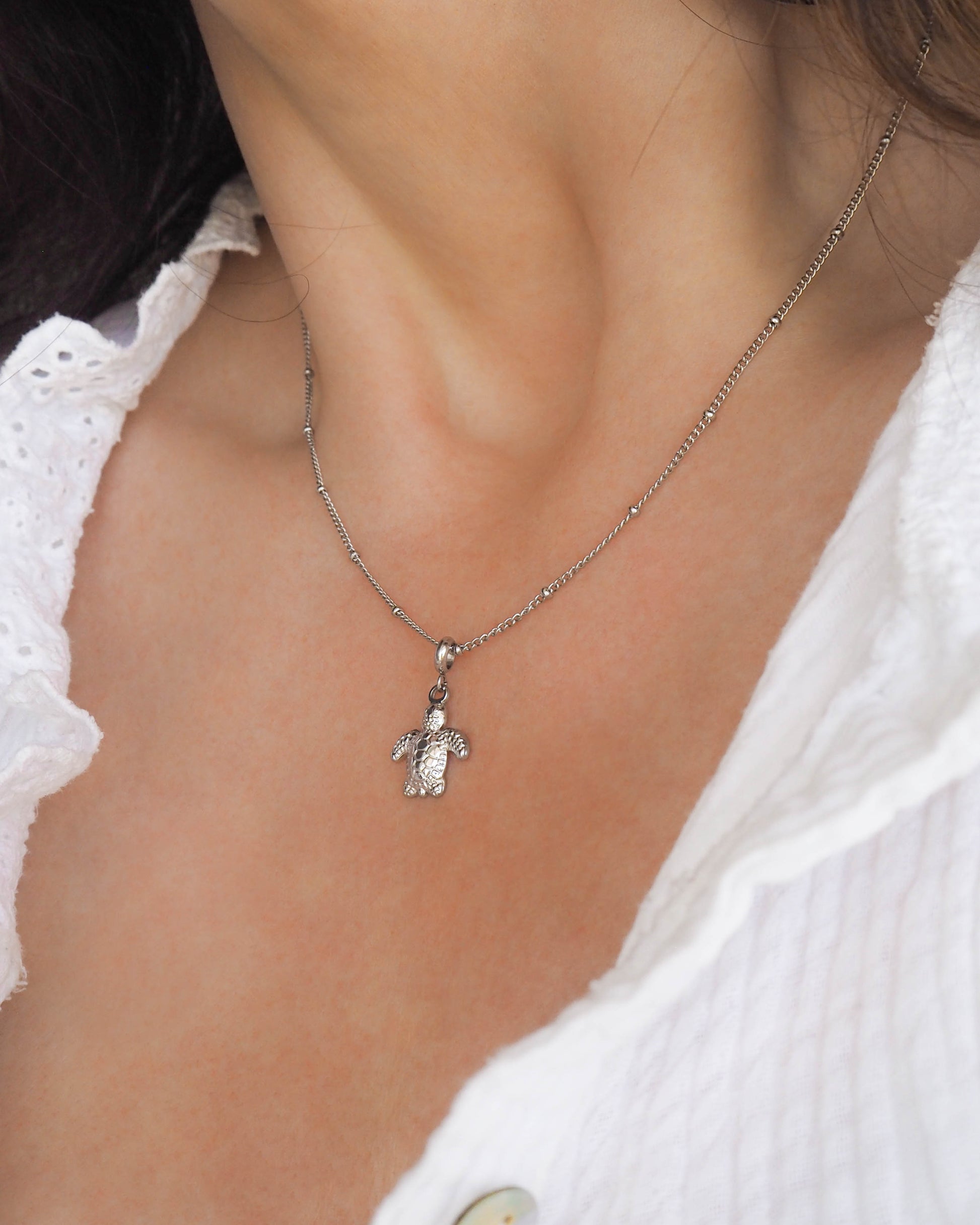 Model wearing Silver Turtle Necklace