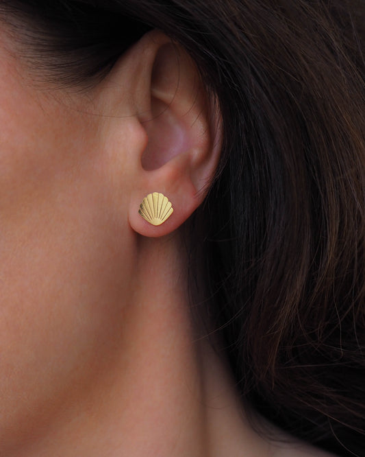 Model wearing Gold Shell Stud Earrings Coastal-inspired Jewelry