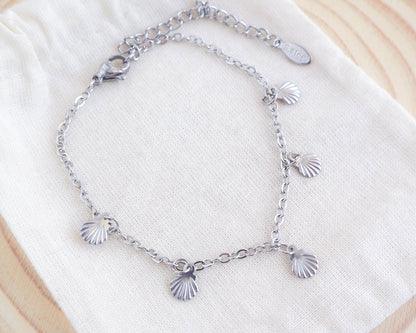 Silver Tiny Shell Charm Bracelet on display