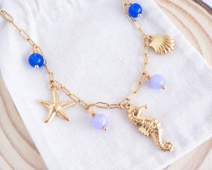 Gold Starfish and Shells Charm Necklace with Aquamarine, Stainless Steel Bracelet, Coastal Summer Jewelry, Beach Girl Gift, Gold Sea Star and Shells Necklace with gemstones, Sea by lou