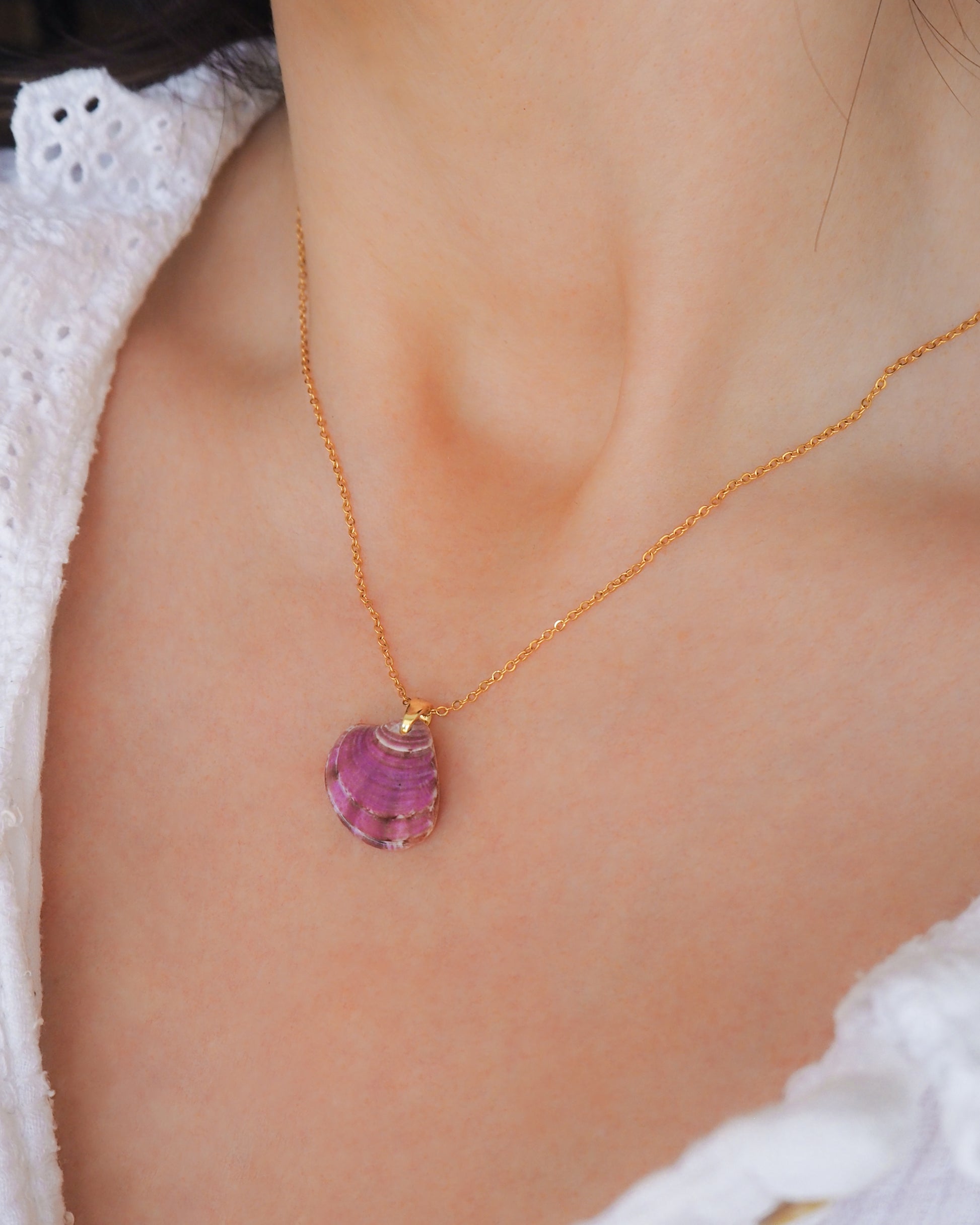Model wearing Purple Plum Venus Shell Gold Necklace from Portugal, seabylou ocean inspired jewelry, real shell necklace