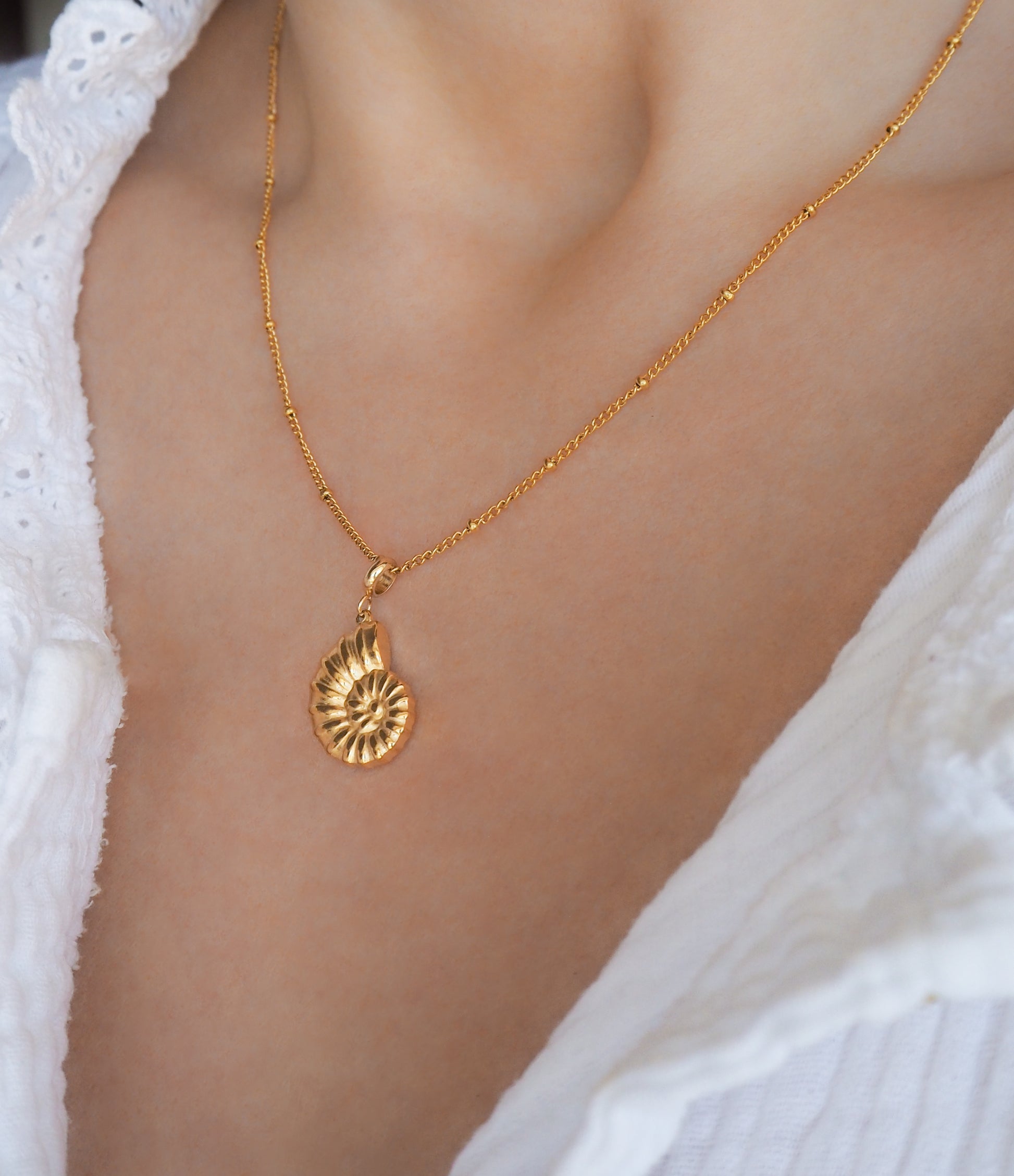 Nautilus Seashell Gold Necklace, Seabylou pendant on neck