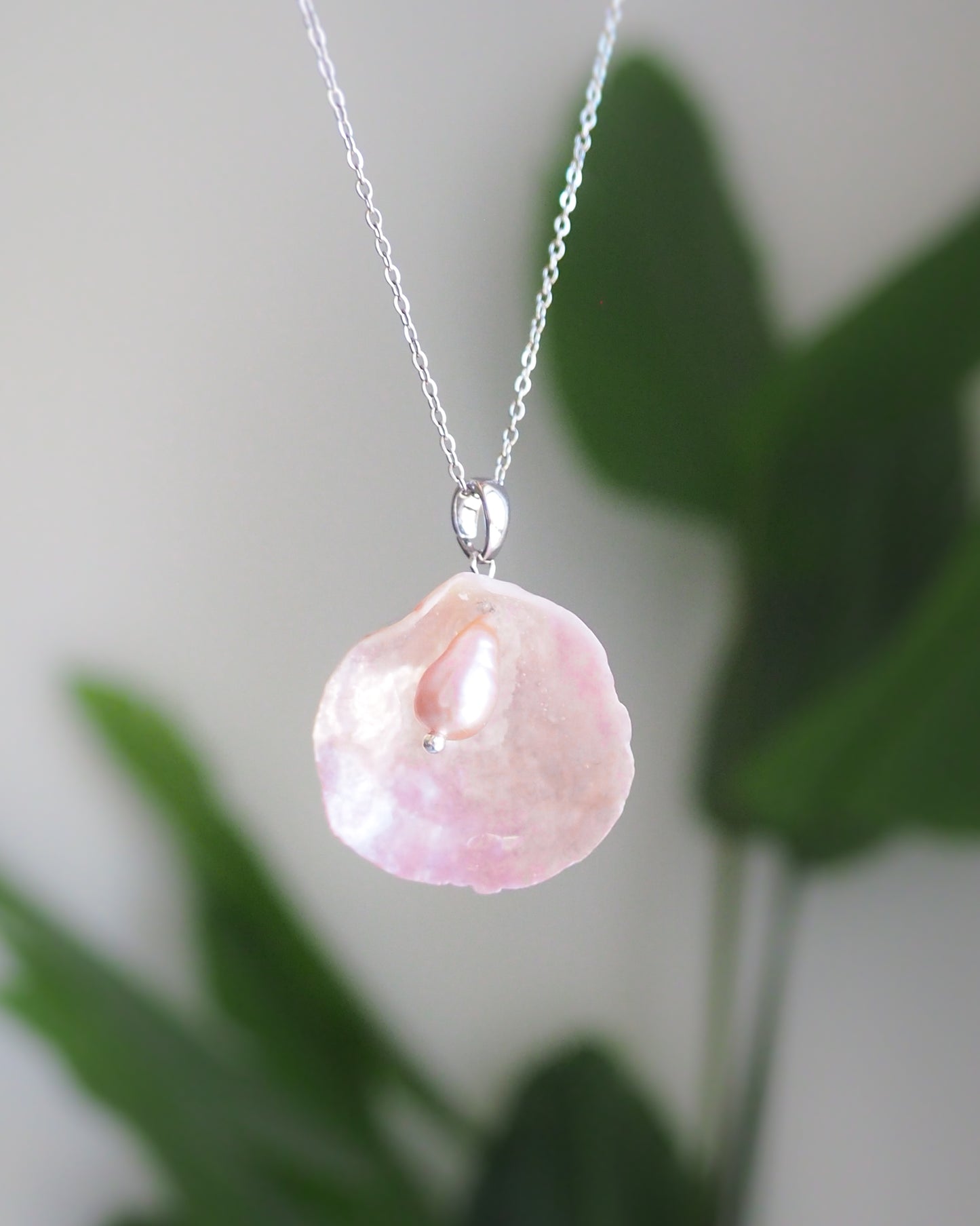 Pink Jingle Shell Silver Necklace with freshwater pearl, Mother of Pearl Pendant front view