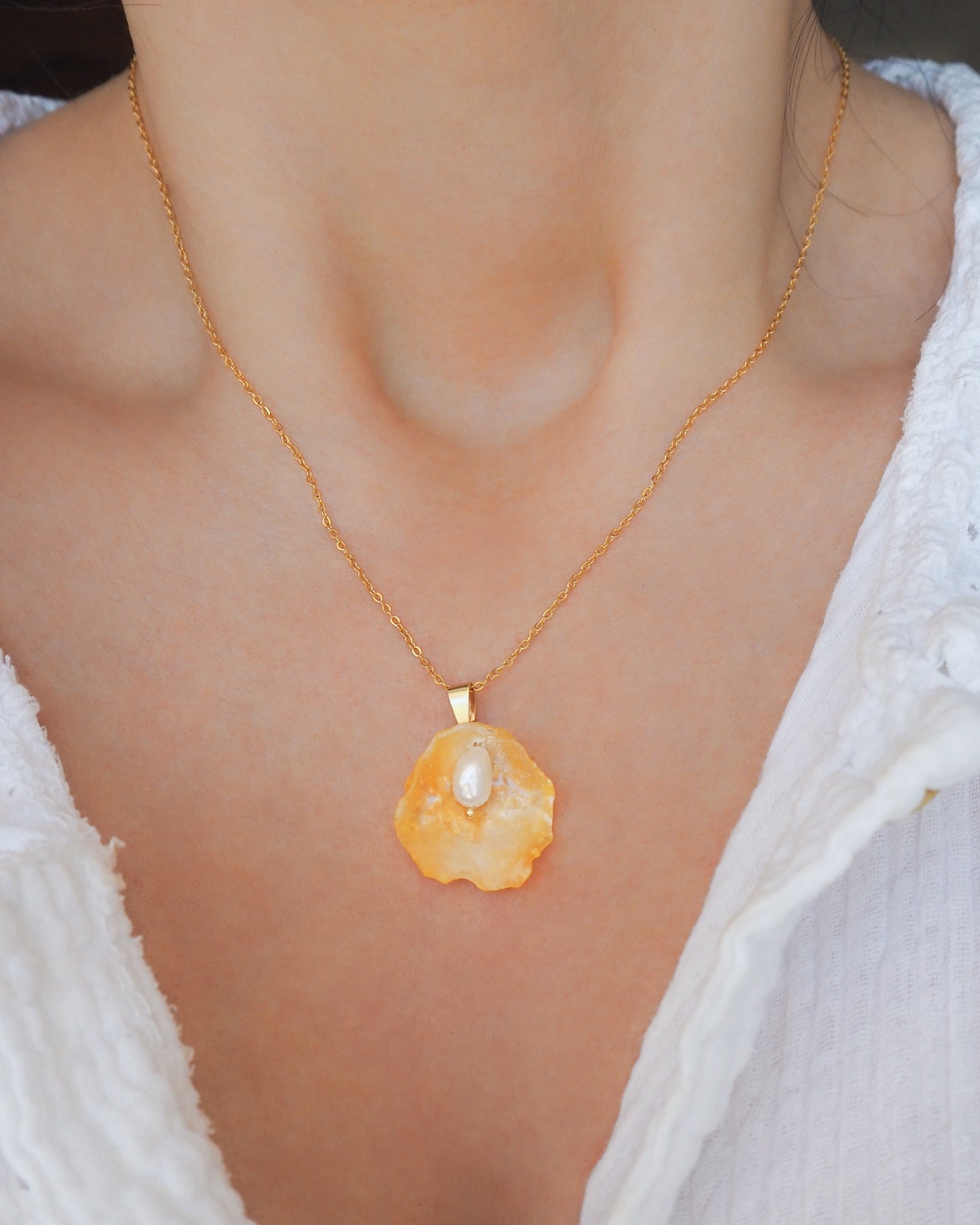 Yellow Jingle Shell Gold Necklace on neck model