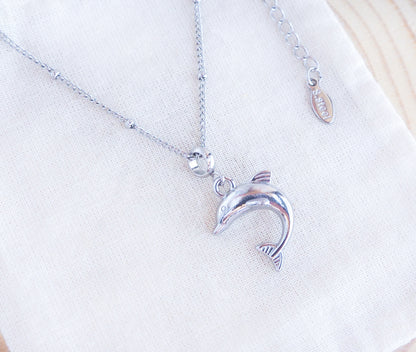 Silver Dolphin Waterproof Necklace on display