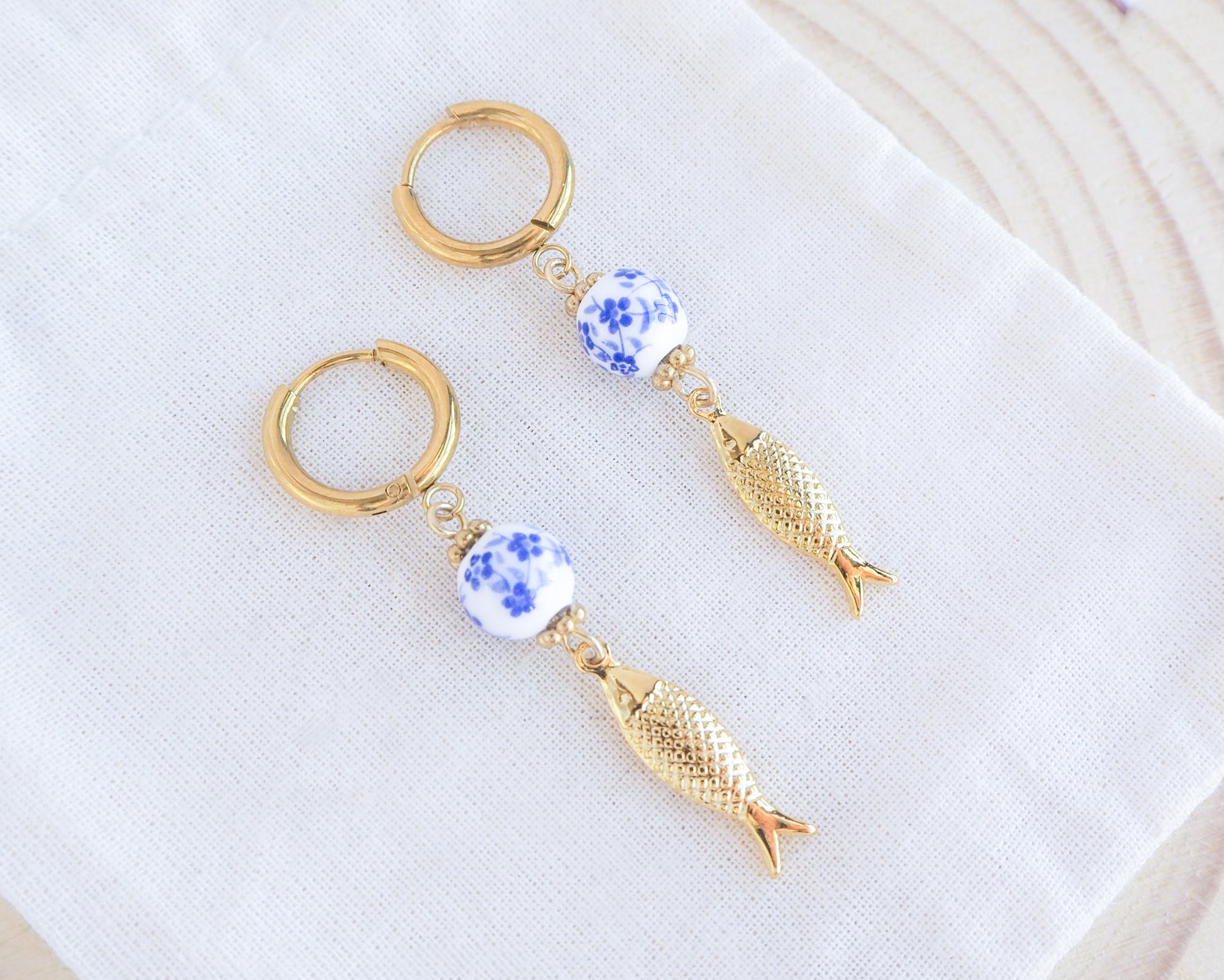 Portuguese Sardine Earrings with Azulejo Tile on display, Gold Plated, Portuguese Ceramic Jewelry