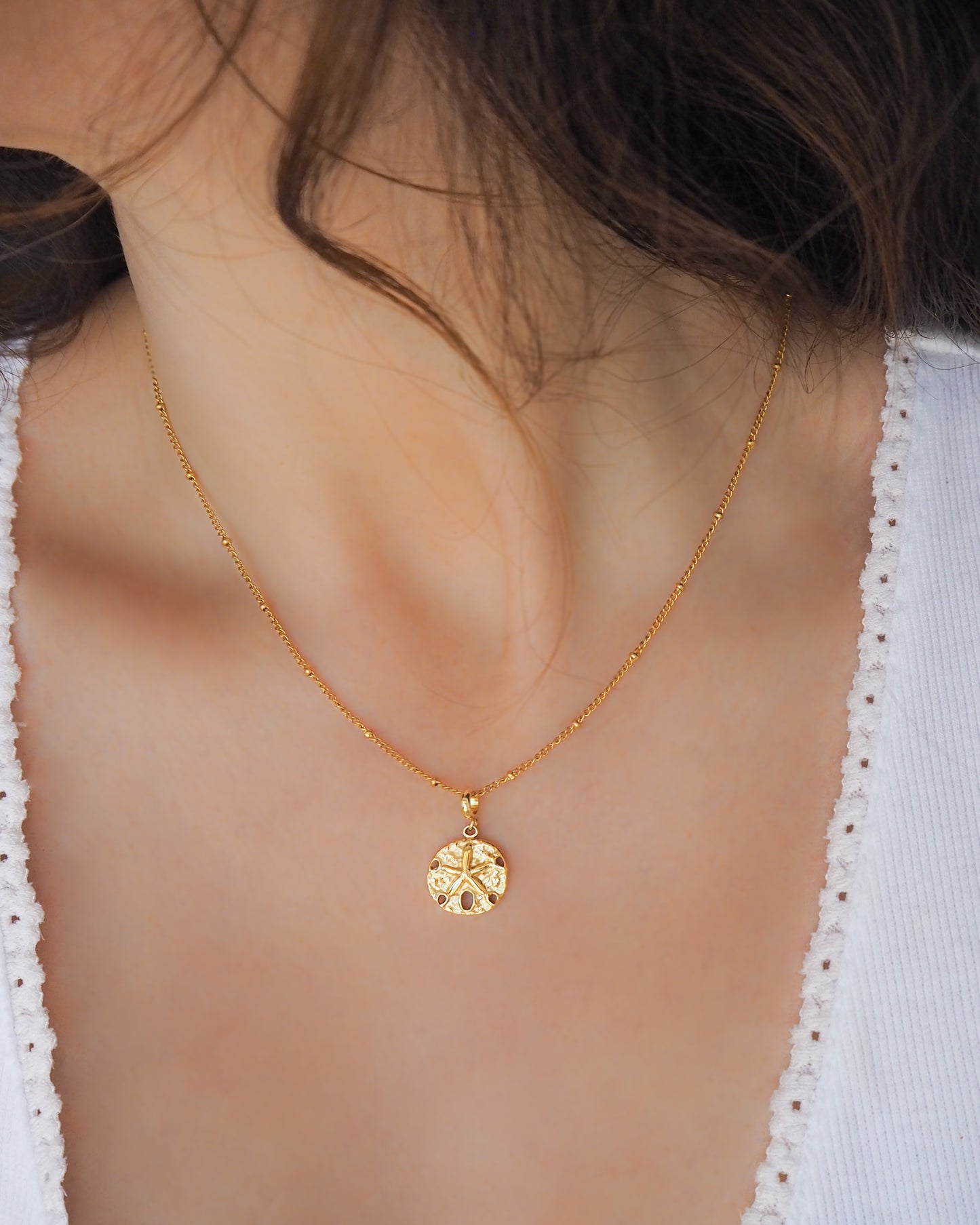 Sand Dollar Necklace Gold Chain on model