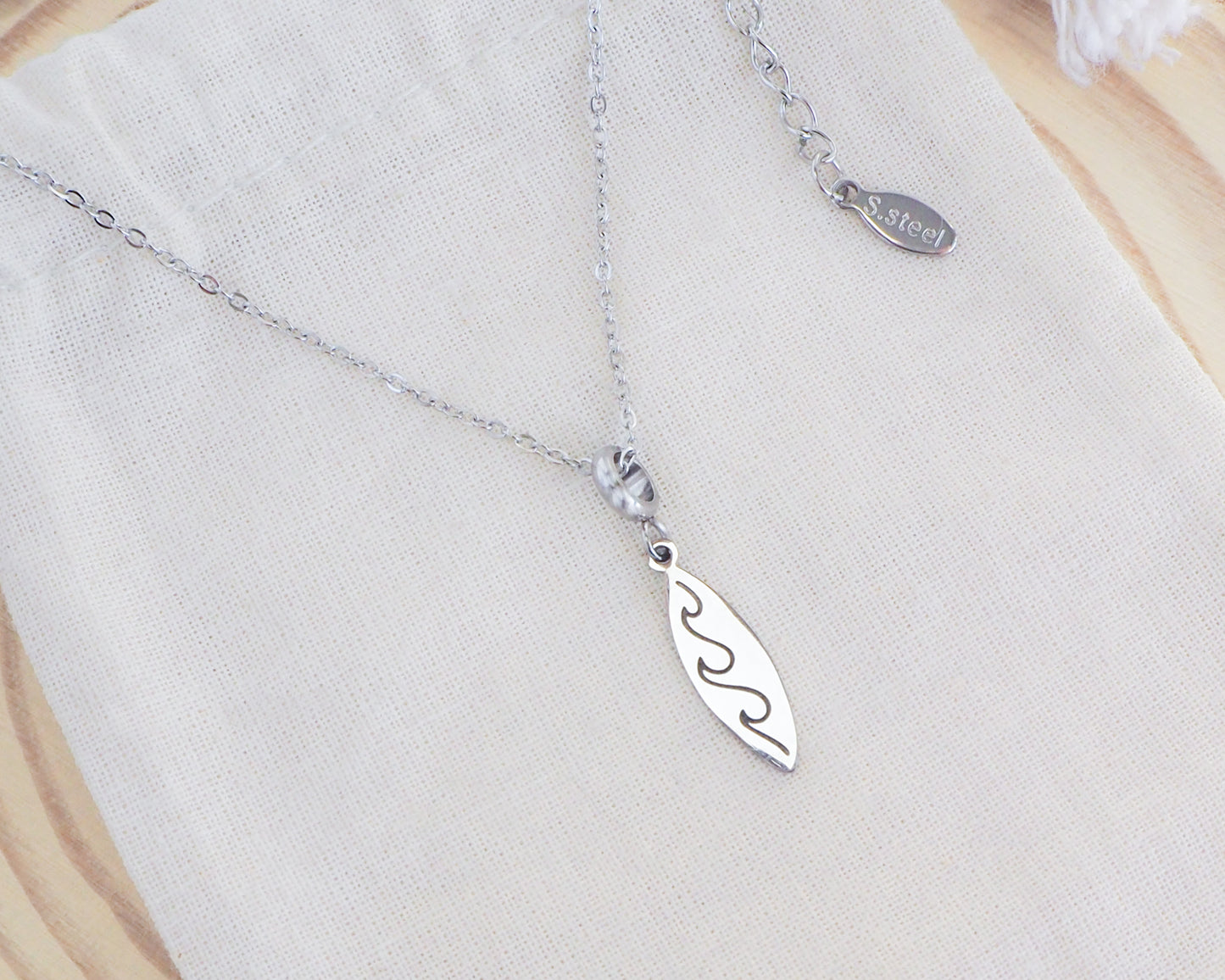 Silver surfboard necklace