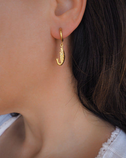 Model wearing Gold Shrimp Earrings, Shrimp Huggies