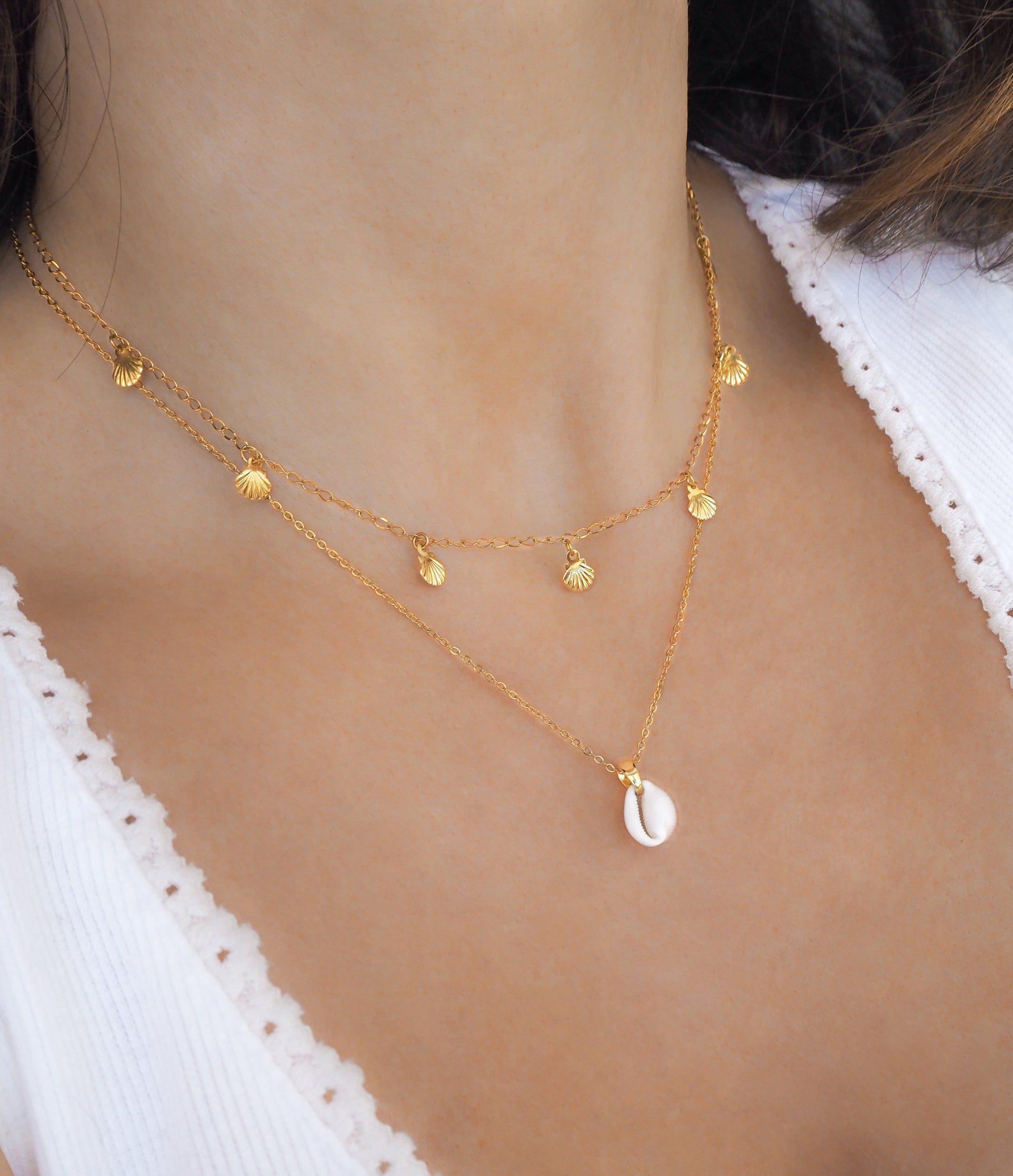 Golden Tiny Shell Charm Necklace on Neck Model, Cowrie Shell Necklace, seabylou, sea by lou