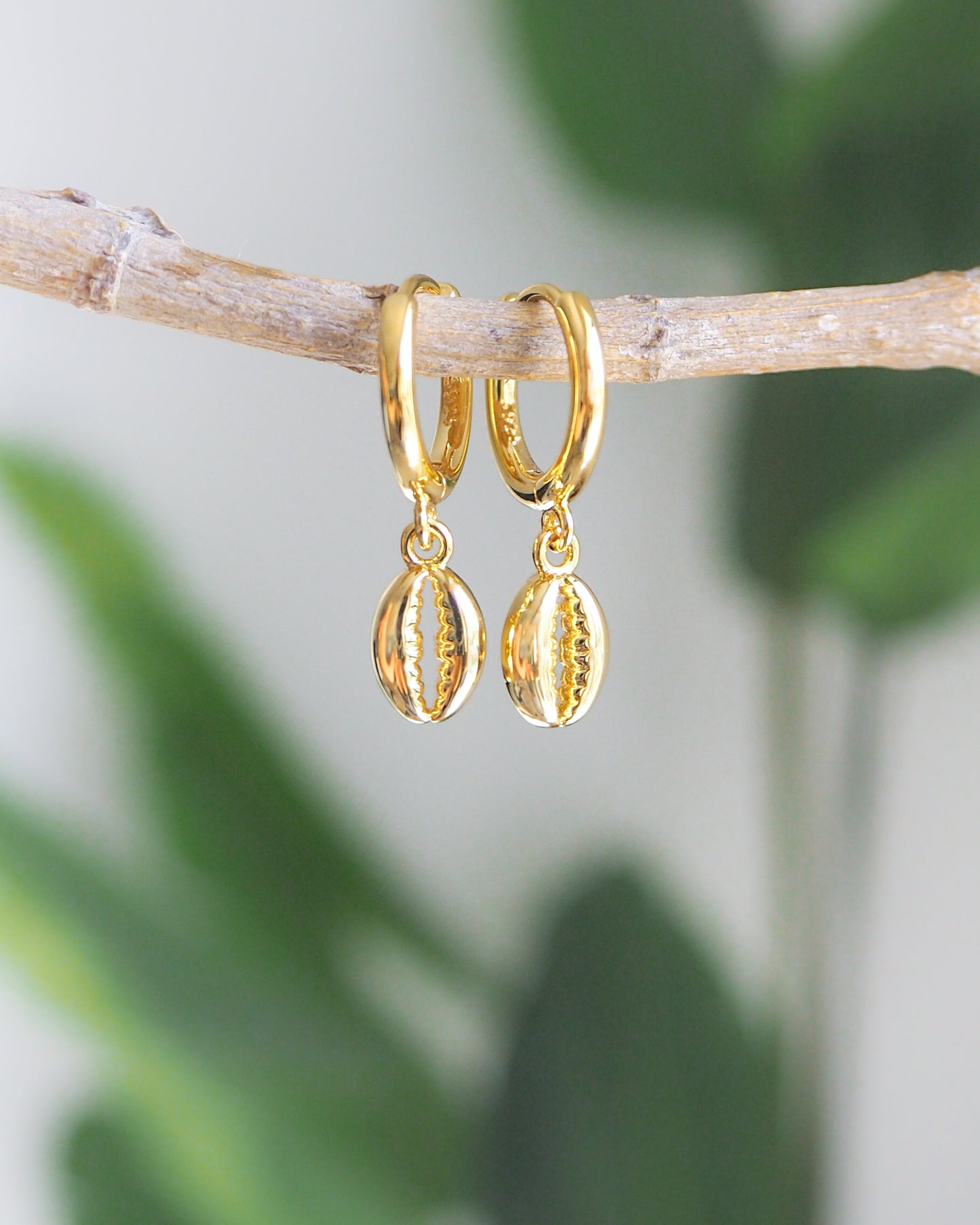 Gold Cowrie Earrings front view, 14k gold vermeil hoop earrings, mix match ocean jewelry