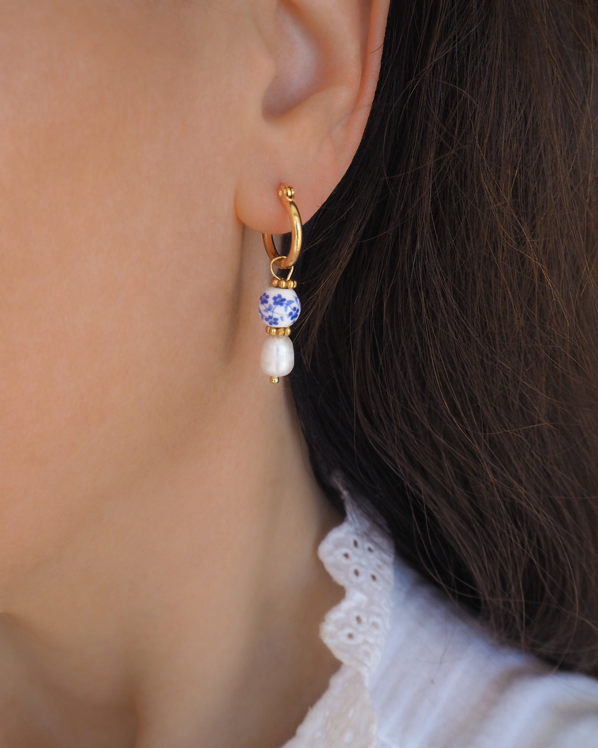 Model wearing Portuguese Ceramic Pearl Earrings, Azulejo Earrings from Portugal, Portuguese Tlles, Blue White Flower Porcelain Earrings