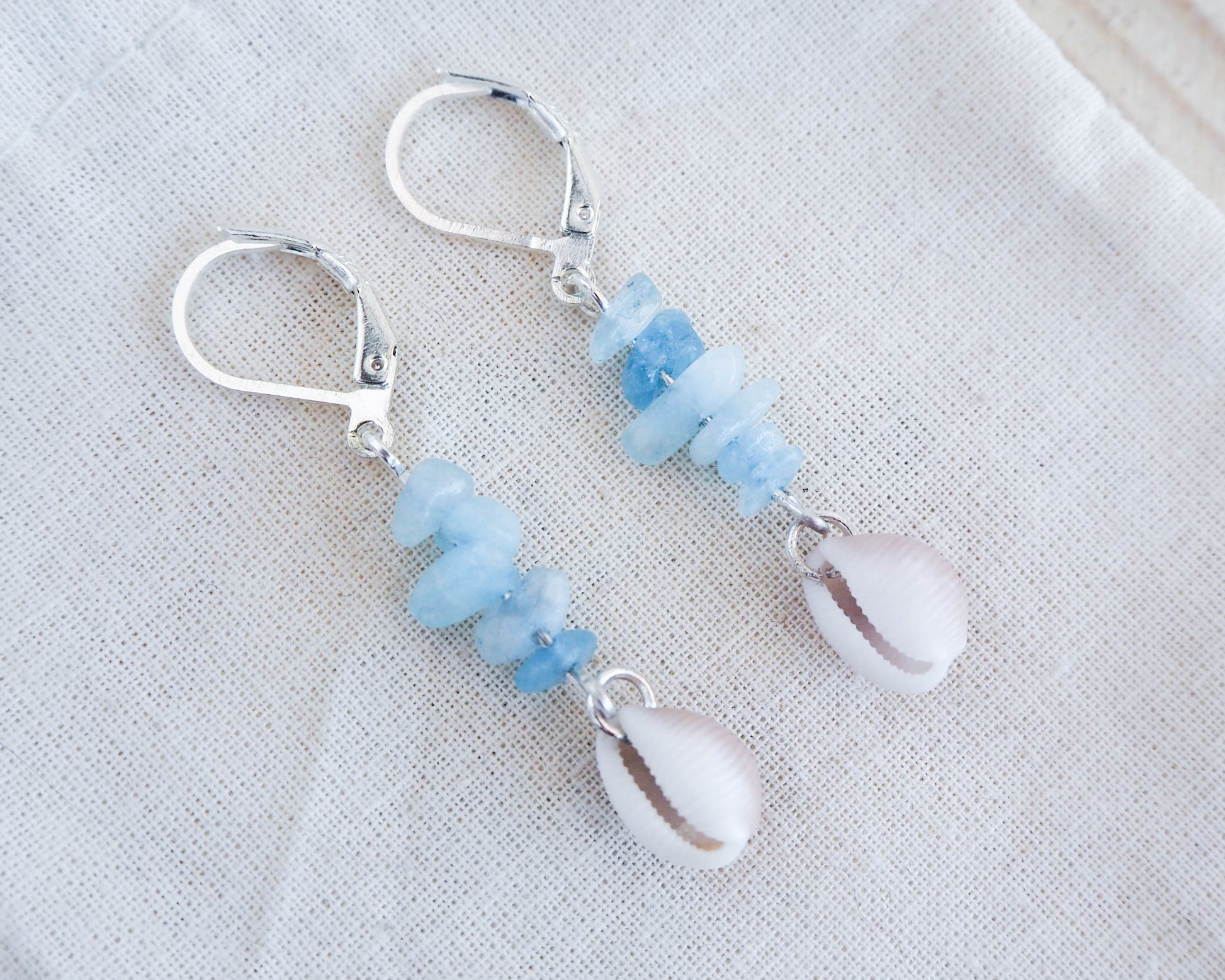 Handcrafted Cowrie Shell Earrings with Aquamarine Stones - a Beach-inspired Delight, seabylou